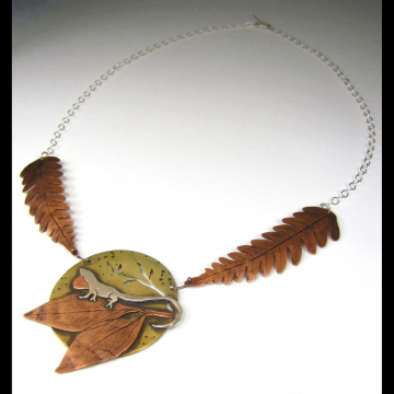 Anole stone and ferns